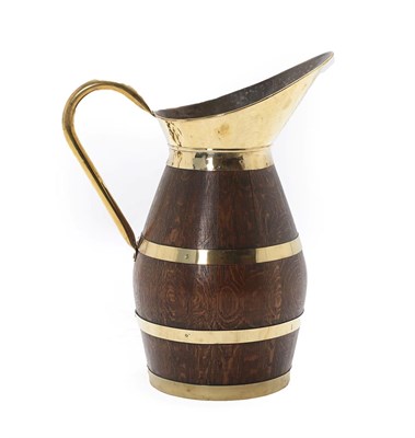 Lot 463 - An Oak and Brass Bound Jug, of staved construction, the barrel form body with three brass...