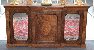 Lot 472 - A Victorian Figured Walnut Breakfront Credenza, circa 1870, the moulded top above a central...