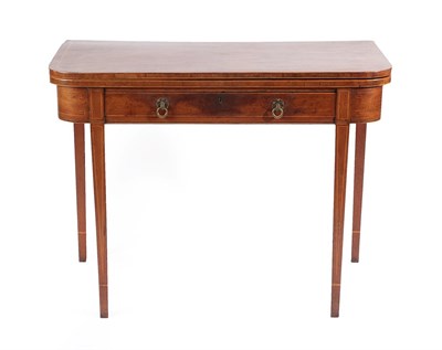 Lot 477 - A George III Mahogany and Boxwood Strung Foldover Tea Table, late 18th century, with single...