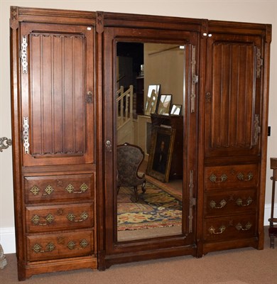 Lot 478 - A Victorian Gothic Revival Oak Wardrobe, 19th century, in the manner of A W N Pugin, the linen fold