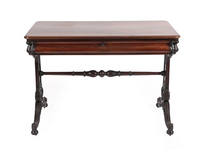 Lot 482 - An Early Victorian Rosewood Writing Table, mid 19th century, of rounded rectangular form, the...