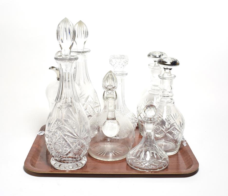 Lot 1 - A silver collared decanter, together with two pairs and another three decanters (8)