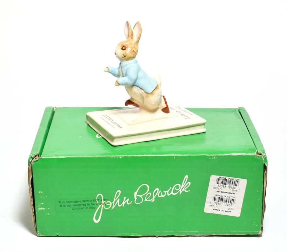Lot 19 - Beswick Beatrix Potter 'Peter on his Book', P4217 to commemorate the 100th anniversary of The Tales