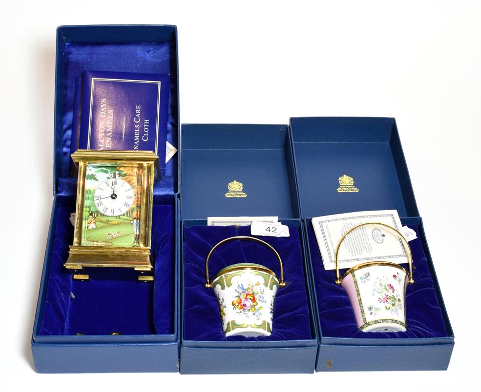 Lot 42 - A Halcyon Days enamel carriage timepiece and two Halcyon Days enamel buckets (3)