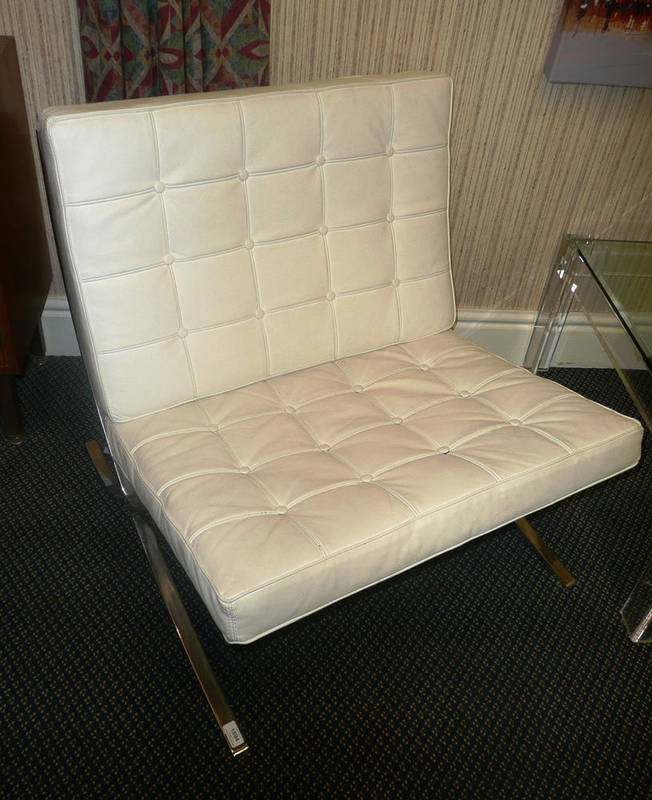 Lot 1594 - A Modern Ludwig Mies van der Rohe Barcelona Chair, white leather padded cushions on...