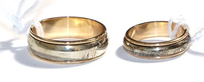 Lot 59 - Two 9 carat bi-colour gold band rings, finger sizes L1/2 and X