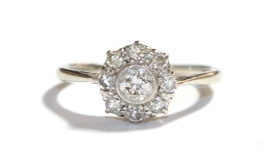 Lot 63 - A diamond cluster ring, stamped '18CT' and 'PLAT', estimated diamond weight 0.50 carat...