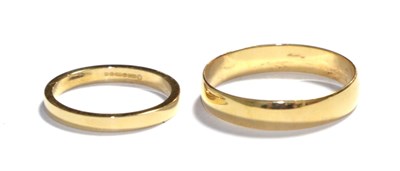 Lot 74 - Two 18 carat gold band rings, finger sizes K and U
