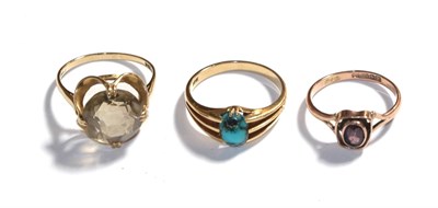 Lot 77 - A turquoise matrix ring, stamped '18CT', finger size Q, a 9 carat gold citrine ring, finger size R
