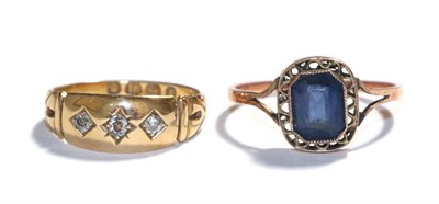 Lot 88 - An 18 carat gold diamond three stone ring, finger size L and a gem set ring, indistinctly...