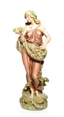 Lot 132 - Post 1919 Royal Dux figure of a fisher woman holding net and shell, model number: 2019, 48cm high