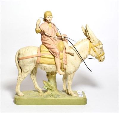 Lot 136 - Post 1919 Royal Dux model of a donkey and rider, model number 2344, 40cm high