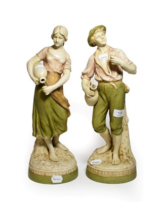 Lot 138 - A pair of post 1919 Royal Dux figures of a man and woman drinking, model numbers: 2155 & 2156, 45cm