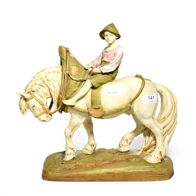 Lot 141 - A post 191 Royal Dux model of a shire horse with young boy astride, model number: 1693, 36cm high