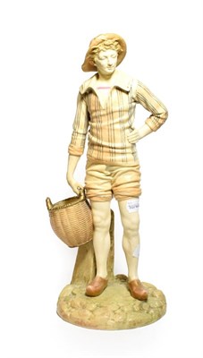 Lot 148 - Royal Worcester figure of a boy and basket, signed by James Hadley, model number: 1202, 45cm high