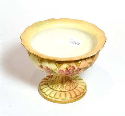 Lot 173 - A Royal Worcester blush ivory floral painted pedestal bowl, shape number: 2287, 14cm high