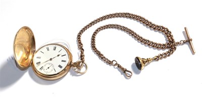 Lot 186 - A full hunter pocket watch, signed Waltham, case stamped '10C', with a curb link 9 carat gold watch