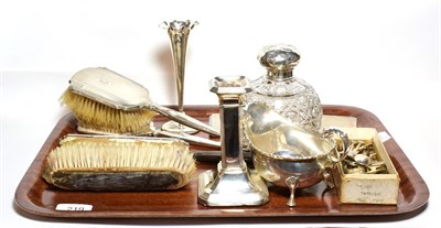 Lot 219 - A quantity of silver including: a sauce boat; two engine-turned cigarette-cases; three sets of...