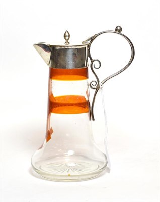 Lot 227 - An Edward VII silver-mounted glass claret-jug, maker's mark worn, Chester 1905, the glass body...