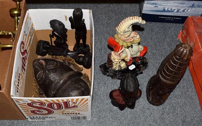 Lot 248 - A Victorian cold painted cast iron Mr Punch doorstop, an African mask and five carved wood figures