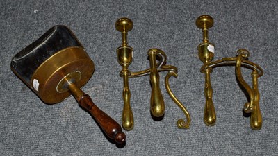 Lot 250 - A pair of brass andirons, a brass scoop and a small oak cabinet (4)