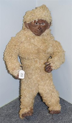 Lot 253 - Leather mounted monkey with fur