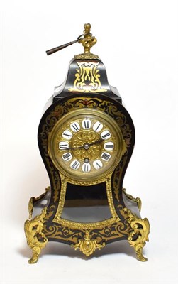 Lot 259 - A late 19th/early 20th century French Boulle style mantle clock with key and pendulum