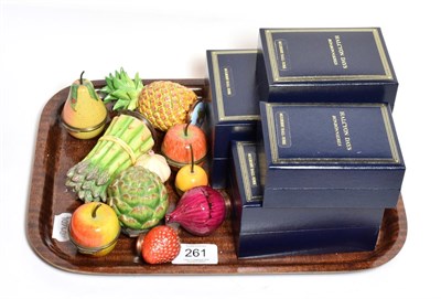 Lot 261 - A group of ten Halcyon Days enamel trinket boxes in the form of fruit and vegetables