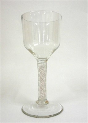 Lot 11 - A Goblet, circa 1770, the funnel bowl on double series opaque twist stem comprising two...