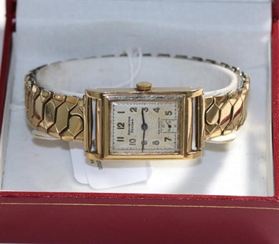 Lot 281 - A 9 carat gold rectangular wristwatch, signed Bravingtons