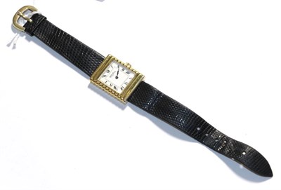 Lot 291 - A Roy King silver gilt tank faced wristwatch on leather strap