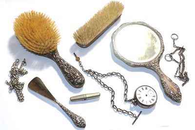 Lot 293 - A silver pocket watch, four silver chains, a corkscrew and a dressing table set