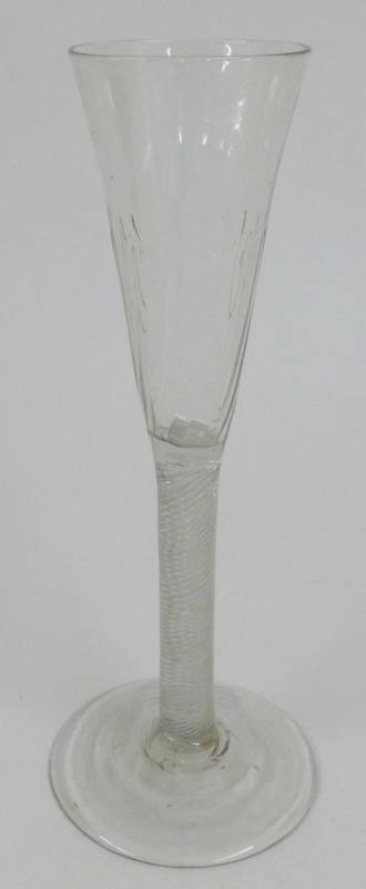 Lot 13 - A Ratafia Glass, circa 1770, the semi-wrythen fluted bowl on an air twist stem and circular...