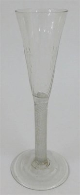 Lot 13 - A Ratafia Glass, circa 1770, the semi-wrythen fluted bowl on an air twist stem and circular...