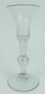 Lot 14 - A Baluster Wine Glass, circa 1750, the bell shape bowl on stem with air tear and basal baluster...