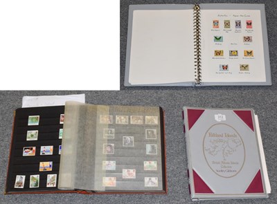 Lot 312 - An orange stamp album, gilt mounted, with various modern content with a Falkland Islands...