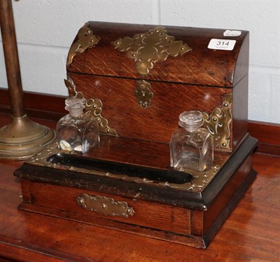 Lot 314 - A Victorian oak and brass bound ink standish/correspondence box