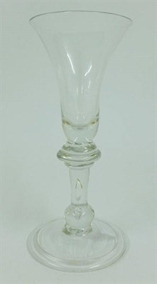 Lot 16 - A Baluster Wine Glass, circa 1730, the bell shaped bowl on an annular knop, the stem with air...