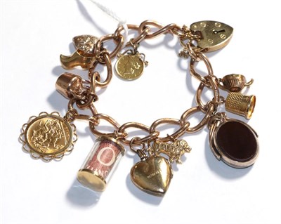 Lot 352 - A charm bracelet, each link stamped '9' and '375' hung with various charms including a hard...