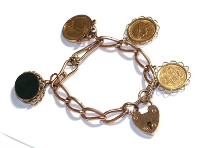 Lot 373 - A curb link bracelet, stamped '9' and '.375' hung with an 1892 full sovereign, two half...