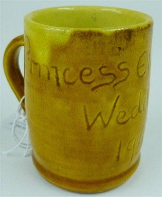 Lot 21 - A Ewenny Pottery Royal Commemorative Mug, dated 1947, of cylindrical form, incised PRINCESS...