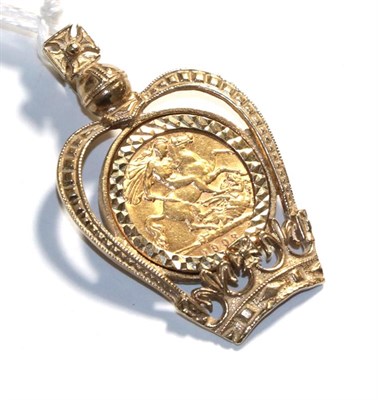 Lot 385 - A 1908 half sovereign mounted as a pendant with crown, length 4.4cm