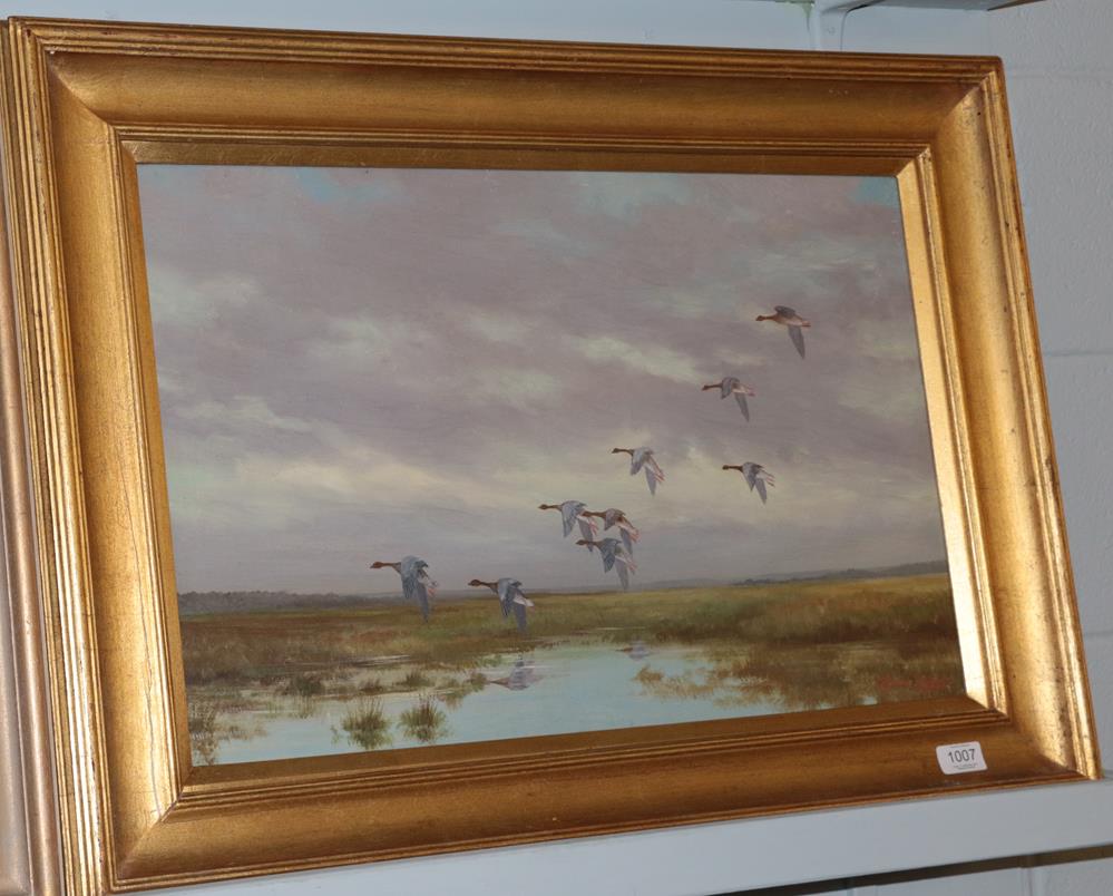 Lot 1007 - Wilfred Bailey, Geese over marshes, signed, oil on canvas, 39cm by 60cm