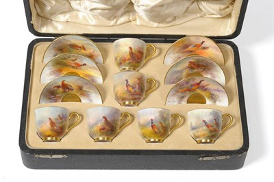 Lot 29 - A Cased Set of Six Royal Worcester Porcelain Coffee Cups and Saucers, painted by James Stinton,...