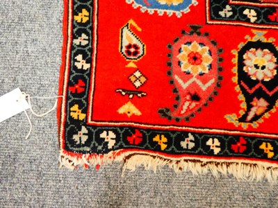 Lot 1105 - A Senneh Kilim, the indigo field with central stepped medallion enclosed by multiple borders, 146cm