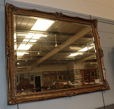 Lot 1145 - A refraction gilt bevel glass mirror