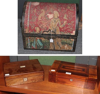 Lot 1147 - Small domed trunk with tapestry mount bound in metal; inlaid hinged work box and another in...