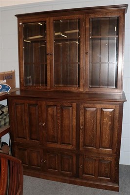 Lot 1153 - A bespoke-made oak bookcase cabinet