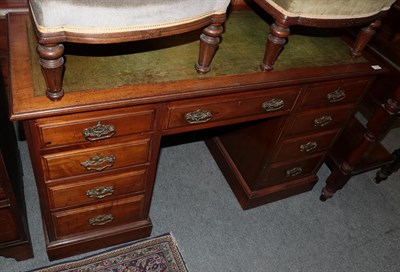 Lot 1173 - A late Victorian walnut twin pedestal desk