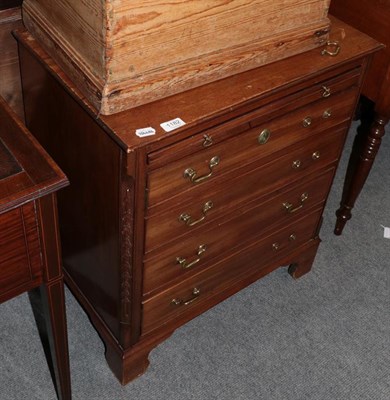 Lot 1182 - A mahogany cupboard with brushing slide in the form of a four drawer chest